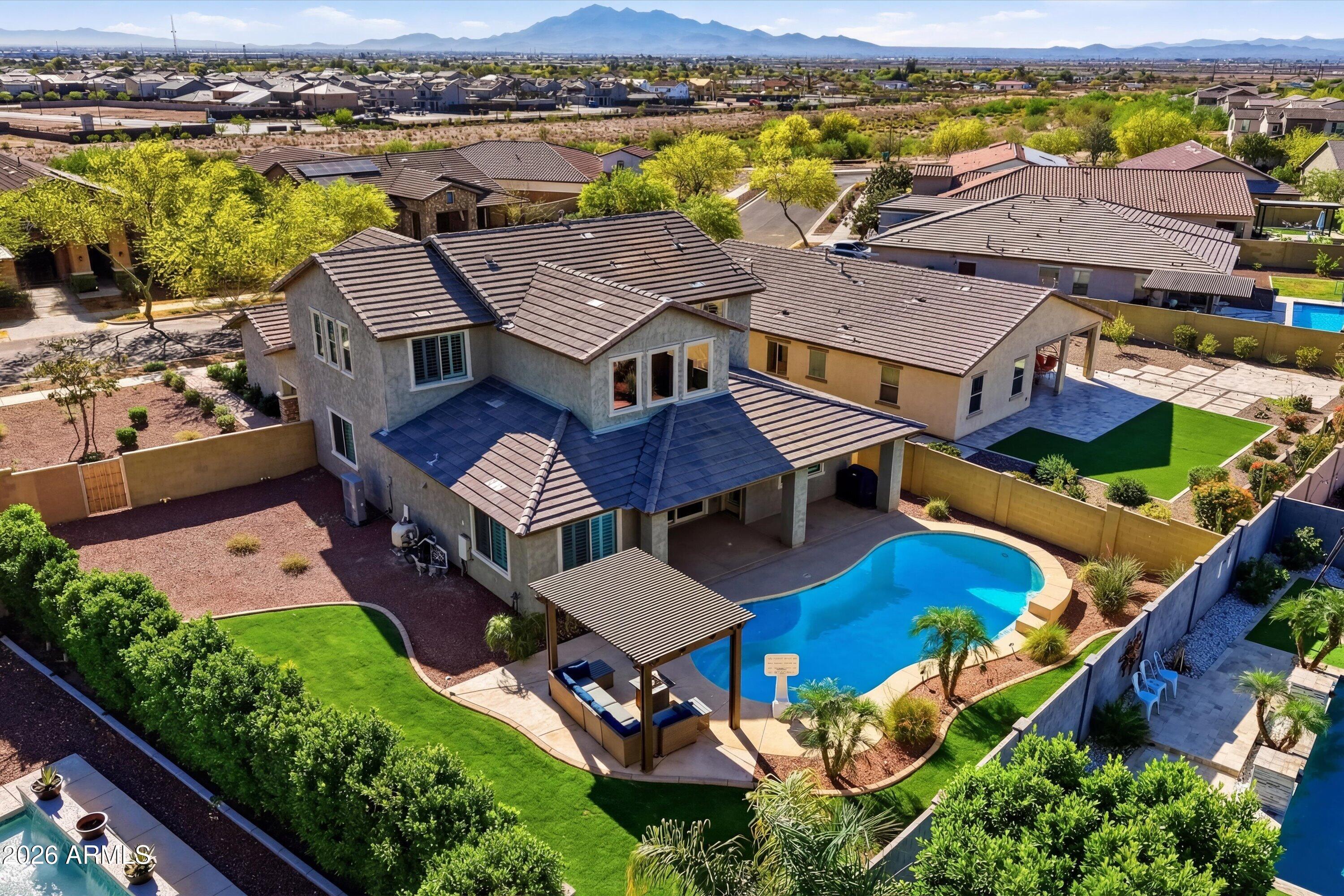 2624 North Black Rock Road Buckeye, AZ 85396 - Photo 2 of 89 099-DJI_20260317090250_0032_D_grass_899f