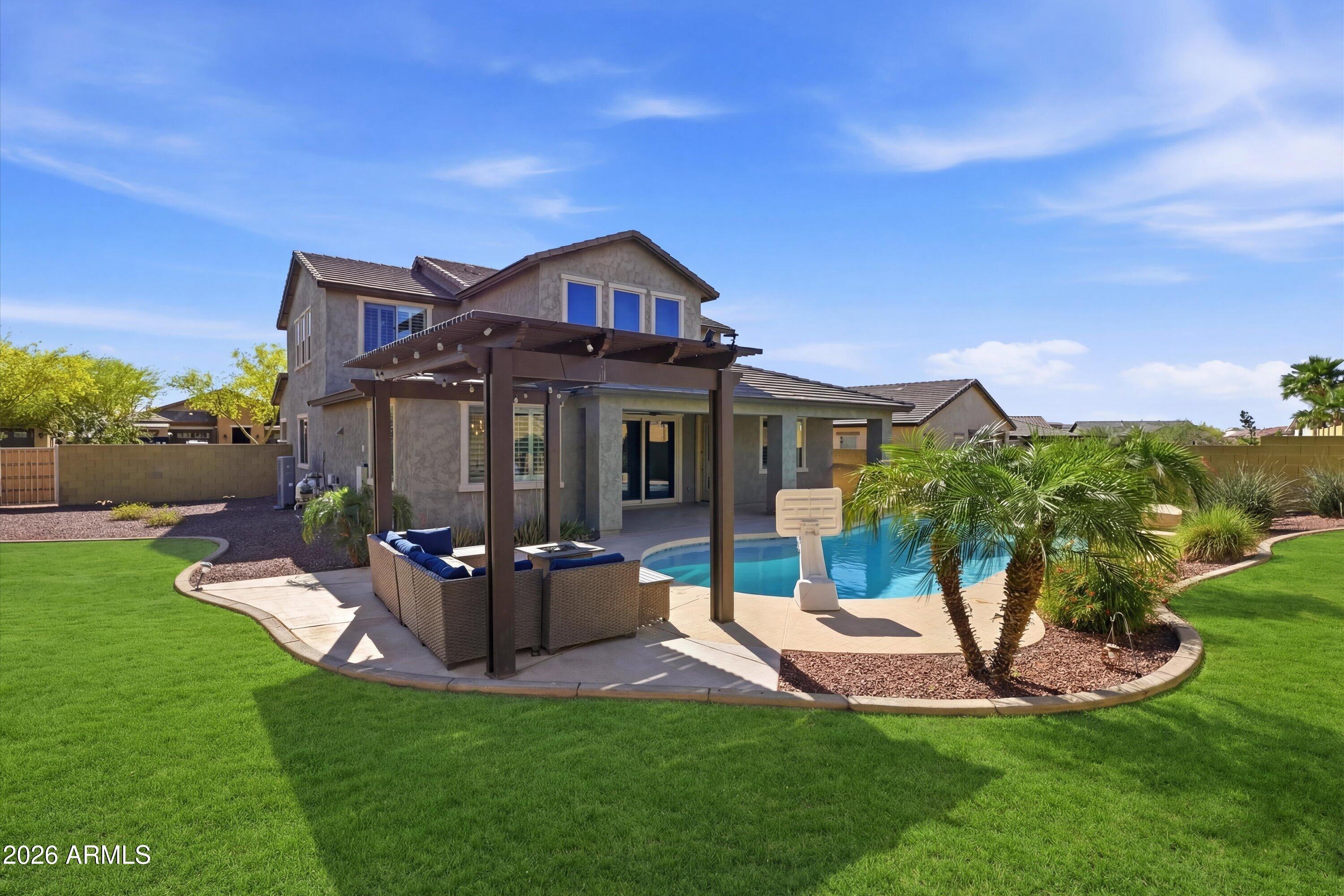 2624 North Black Rock Road Buckeye, AZ 85396 - Photo 3 of 89 097-DSC01897_grass_54c3d684-8a66-47bc-ac