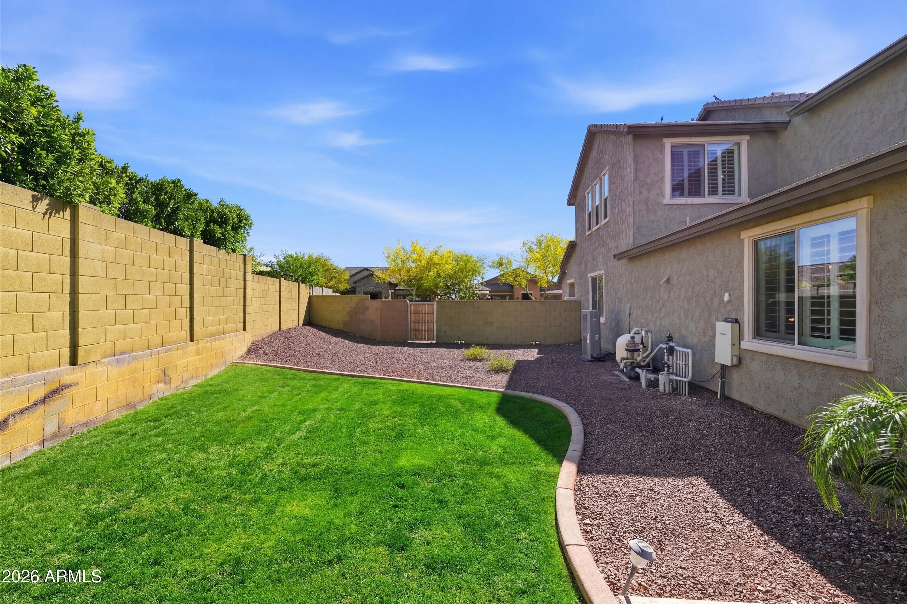 2624 North Black Rock Road Buckeye, AZ 85396 - Photo 66 of 89 096-DSC01888_grass_b9950421-d9f0-4d8c-bb