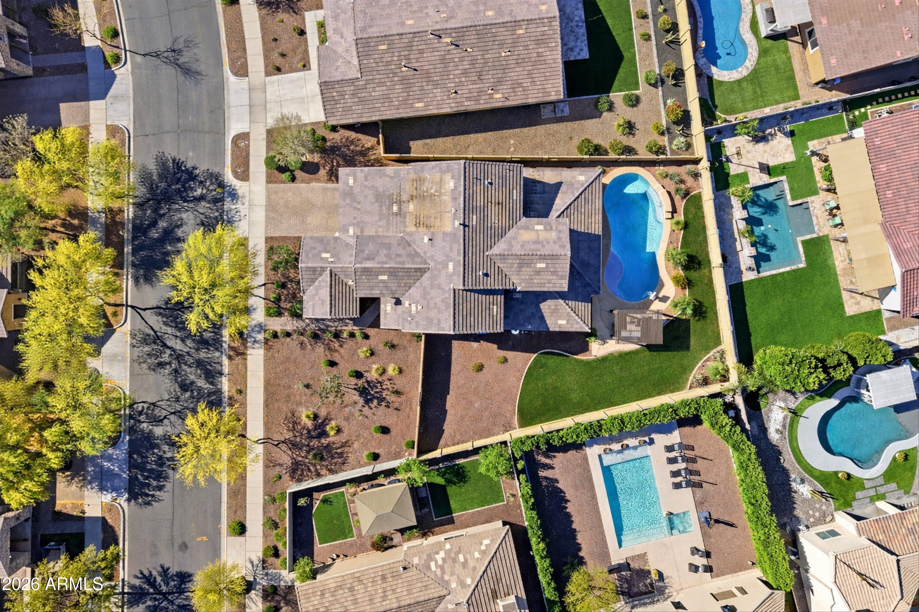 2624 North Black Rock Road Buckeye, AZ 85396 - Photo 8 of 89 100-Suburban neighborhood with pools and