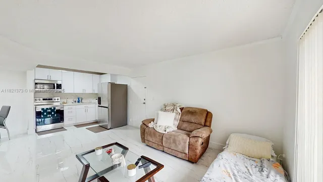 a living room with furniture and a couch