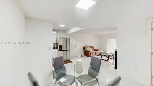 a view of a dining room with furniture