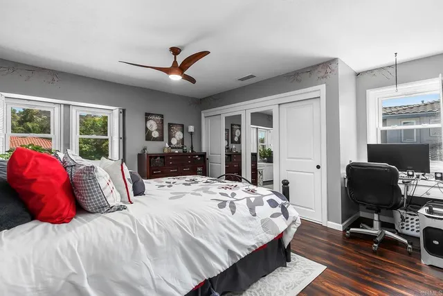 a bed room with a bed and a couch