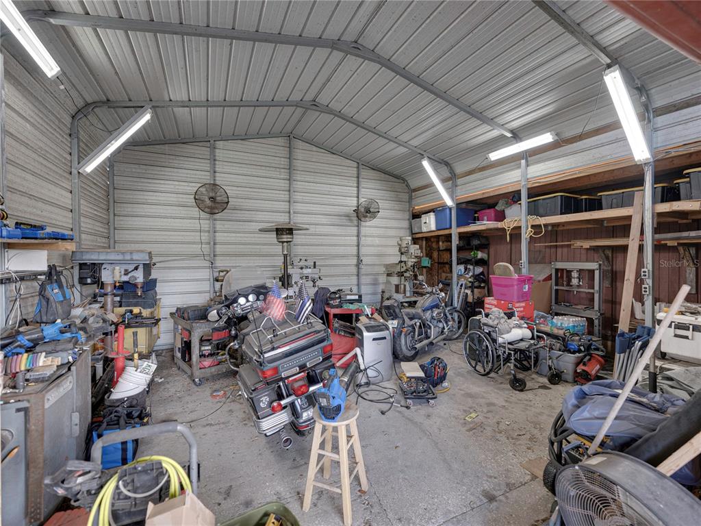 11404 Lithia Pinecrest Road Lithia, FL 33547 - Photo 54 of 63 a view of a storage room with racks