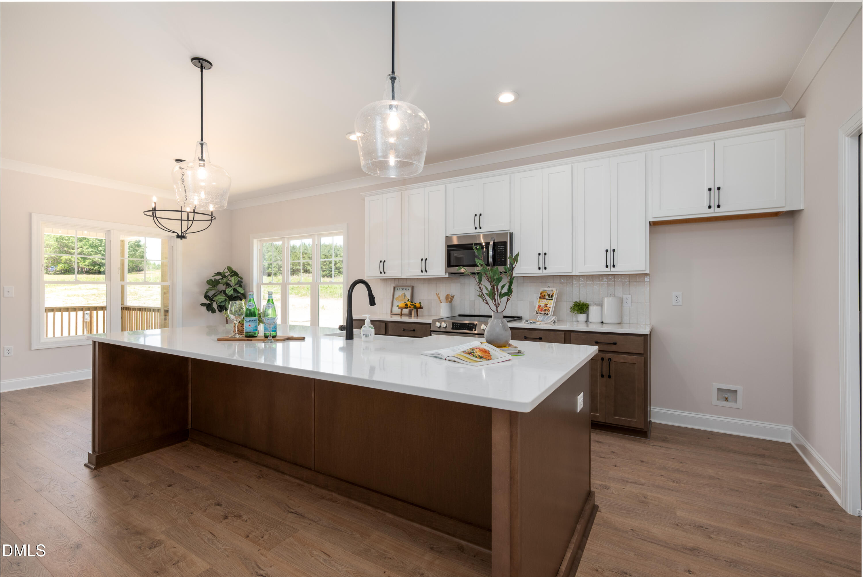 2275 Peachtree Hills Road Spring Hope, NC 27882 - Photo 2 of 43 a kitchen with kitchen island a sink stainless steel appliances and cabinets