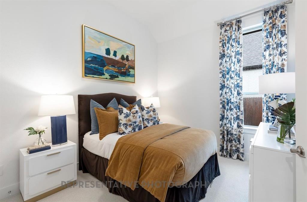 1609 Quartz Street Northlake, TX 76247 - Photo 16 of 40 a bedroom with bed and a painting on the wall