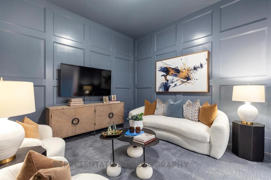 1609 Quartz Street Northlake, TX 76247 - Photo 20 of 40 a living room with furniture and a flat screen tv