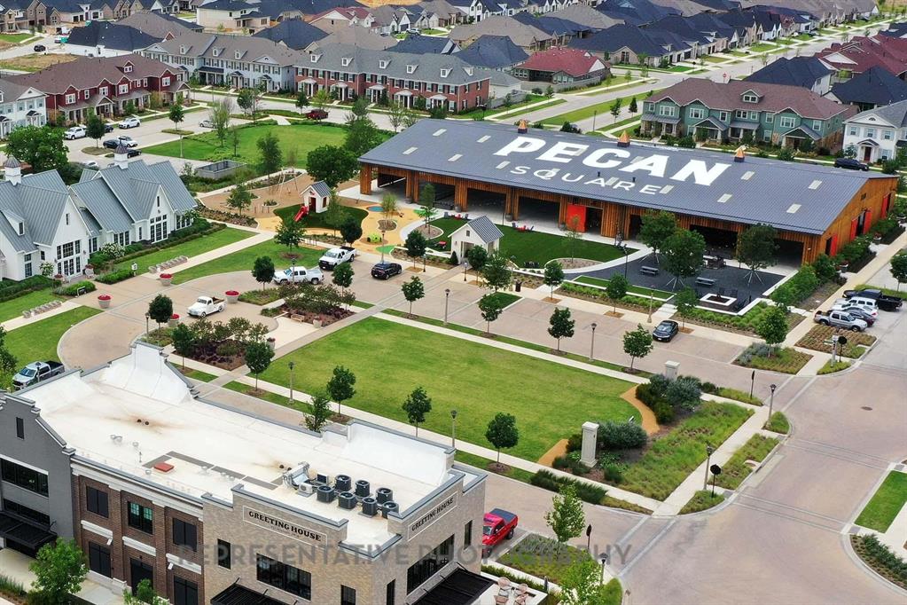 1609 Quartz Street Northlake, TX 76247 - Photo 35 of 40 an aerial view of residential houses with outdoor space and parking