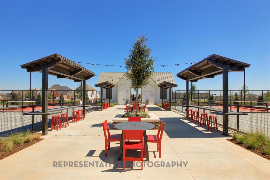 1609 Quartz Street Northlake, TX 76247 - Photo 39 of 40 a patio with table and chairs