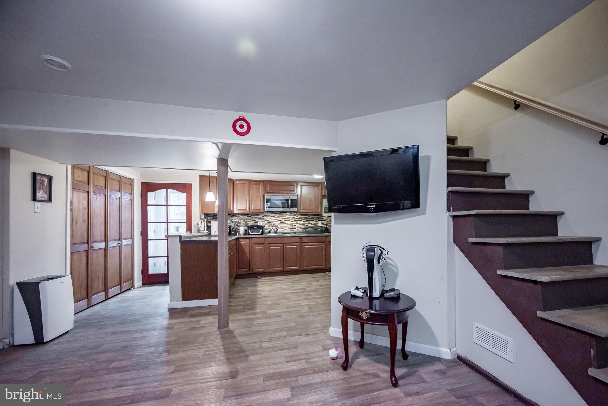 172 Morgantown Road Honey Brook, PA 19344 - Photo 18 of 29 a living room with furniture and a flat screen tv