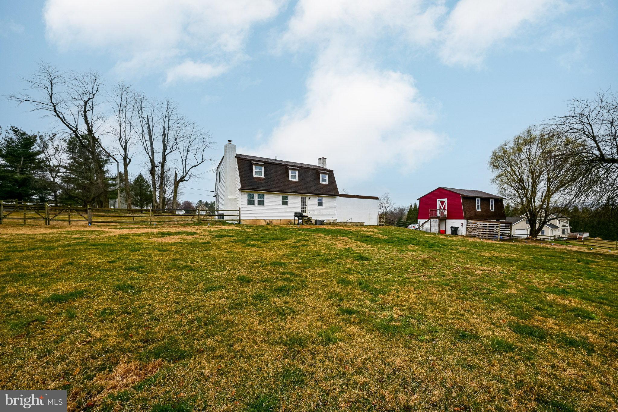 172 Morgantown Road Honey Brook, PA 19344 - Photo 23 of 29 a front view of a house with garden
