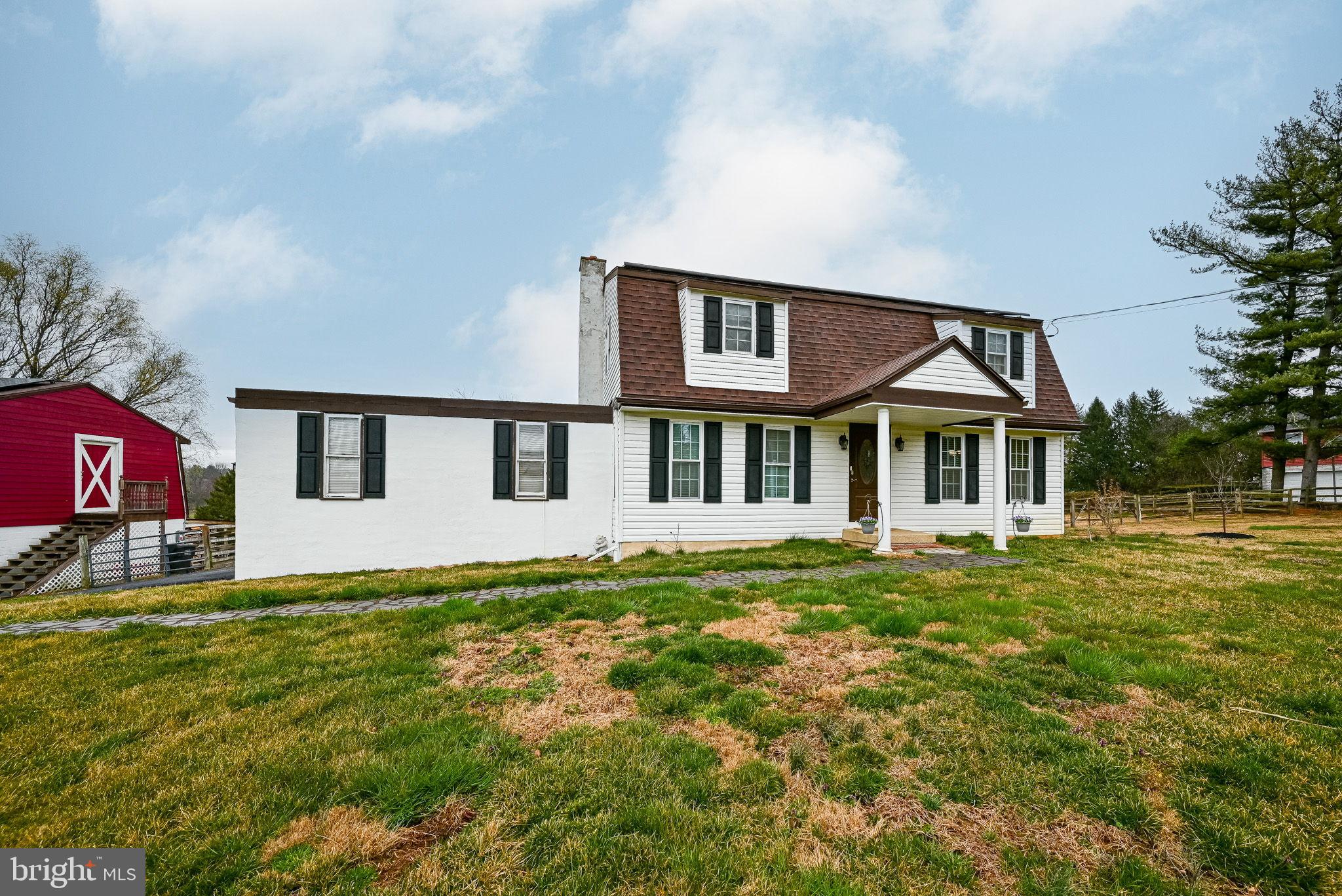 172 Morgantown Road Honey Brook, PA 19344 - Photo 28 of 29 a front view of a house with a yard