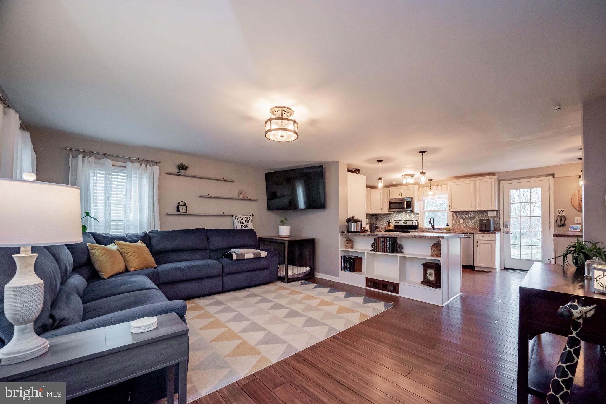 172 Morgantown Road Honey Brook, PA 19344 - Photo 3 of 29 a living room with furniture and a wooden floor