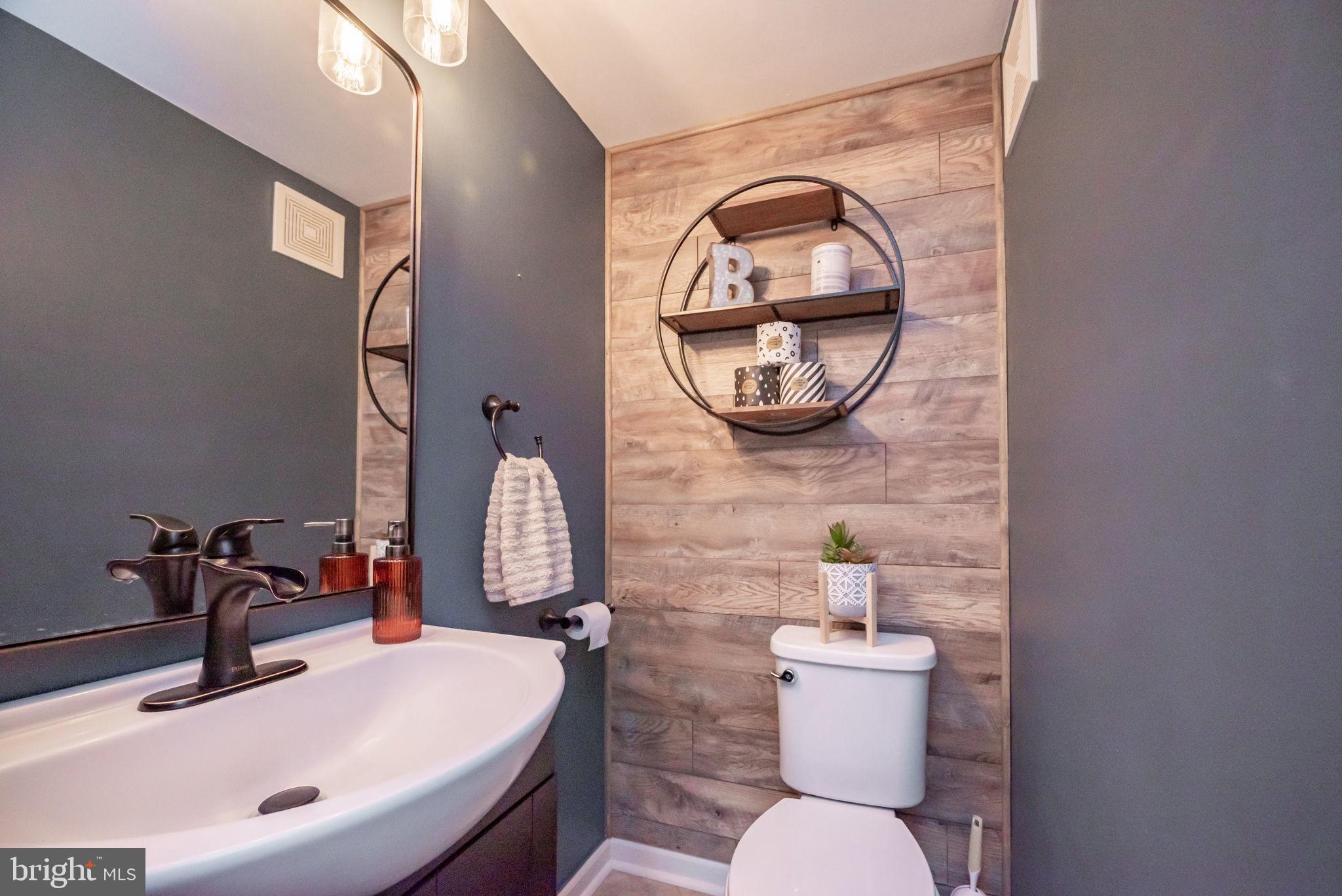 172 Morgantown Road Honey Brook, PA 19344 - Photo 8 of 29 a bathroom with a sink and a mirror