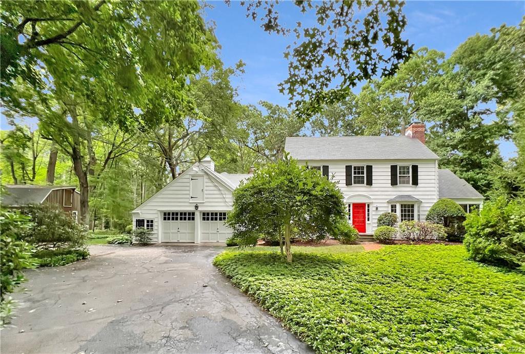 245 Wire Mill Road Stamford, CT 06903 - Photo 1 of 1 a front view of house with yard and green space