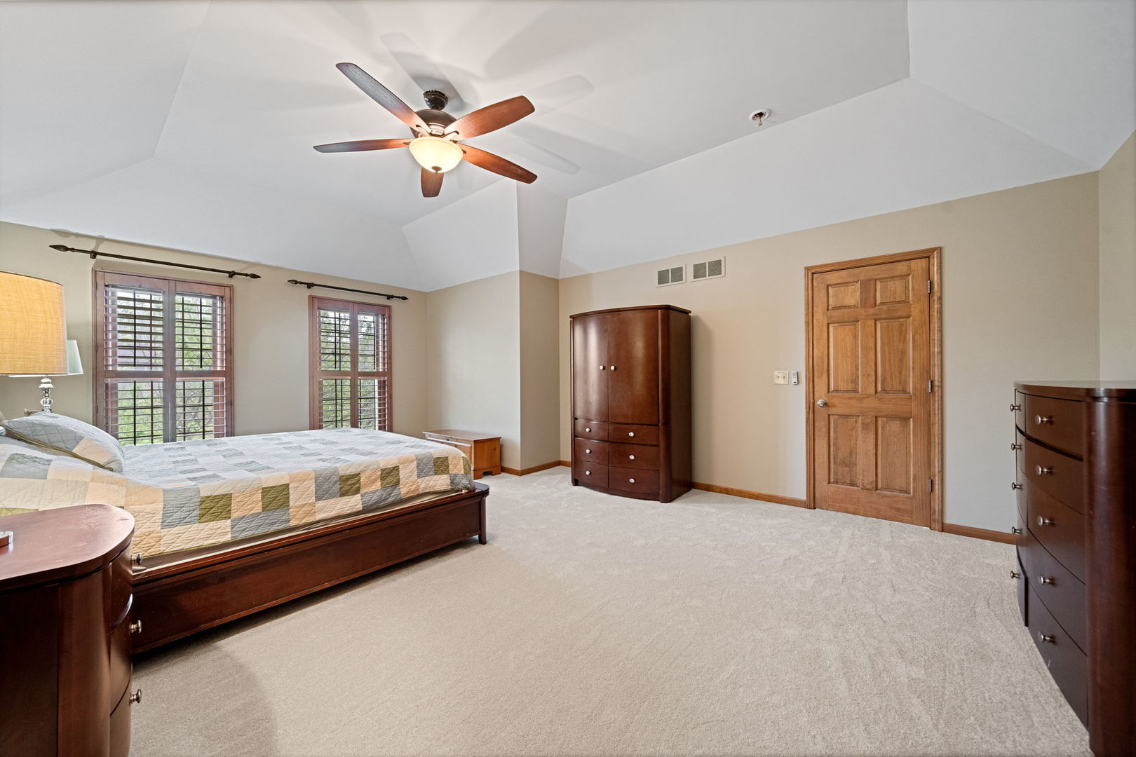 4123 Easy Circle Naperville, IL 60564 - Photo 23 of 45 a living room with bed and furniture with ceiling fan