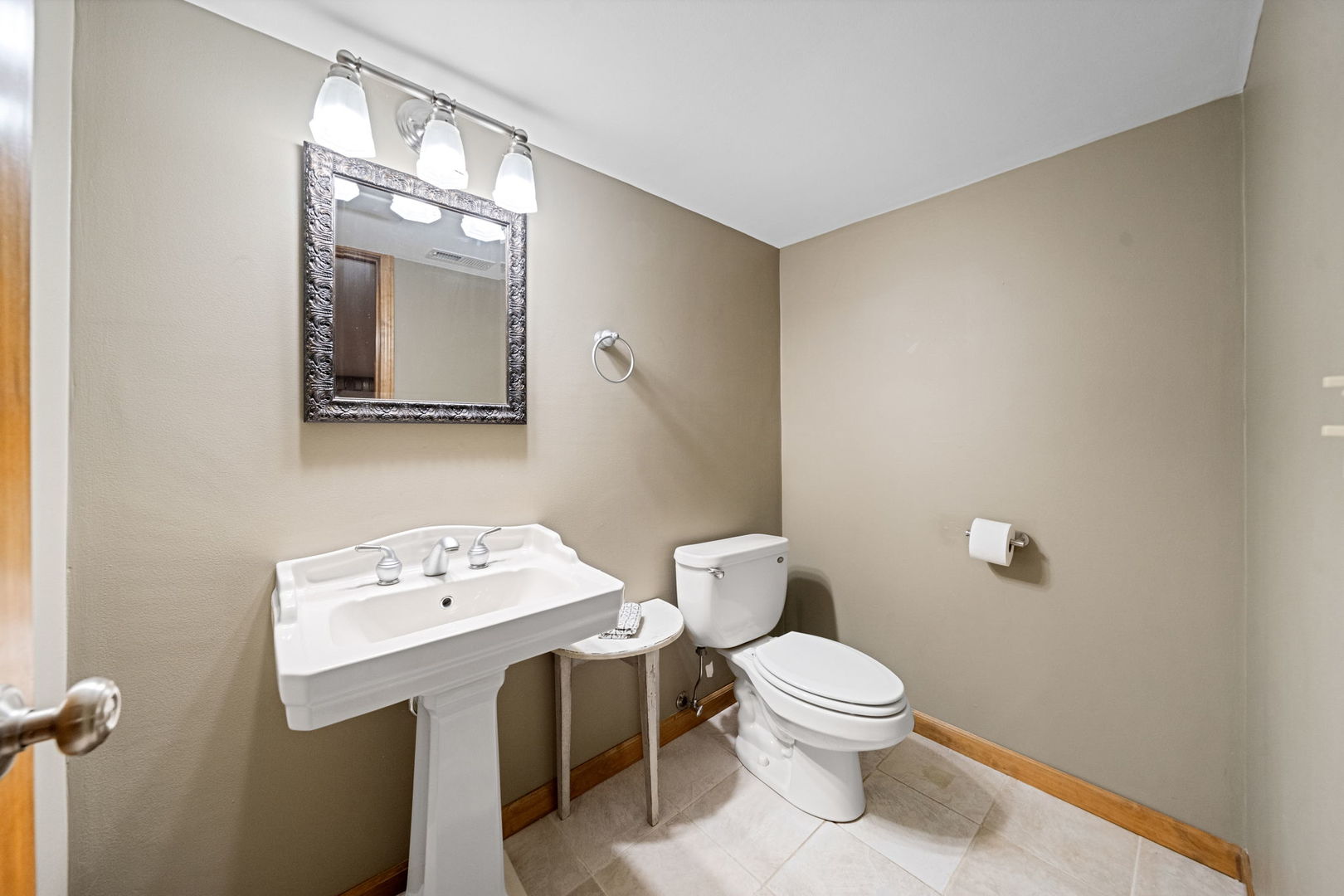 4123 Easy Circle Naperville, IL 60564 - Photo 37 of 45 a bathroom with a toilet a sink and a mirror