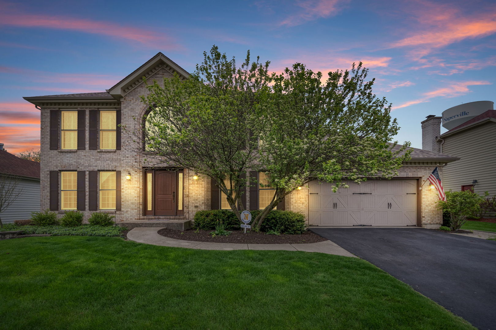 4123 Easy Circle Naperville, IL 60564 - Photo 6 of 45 a front view of a house with a garden and trees