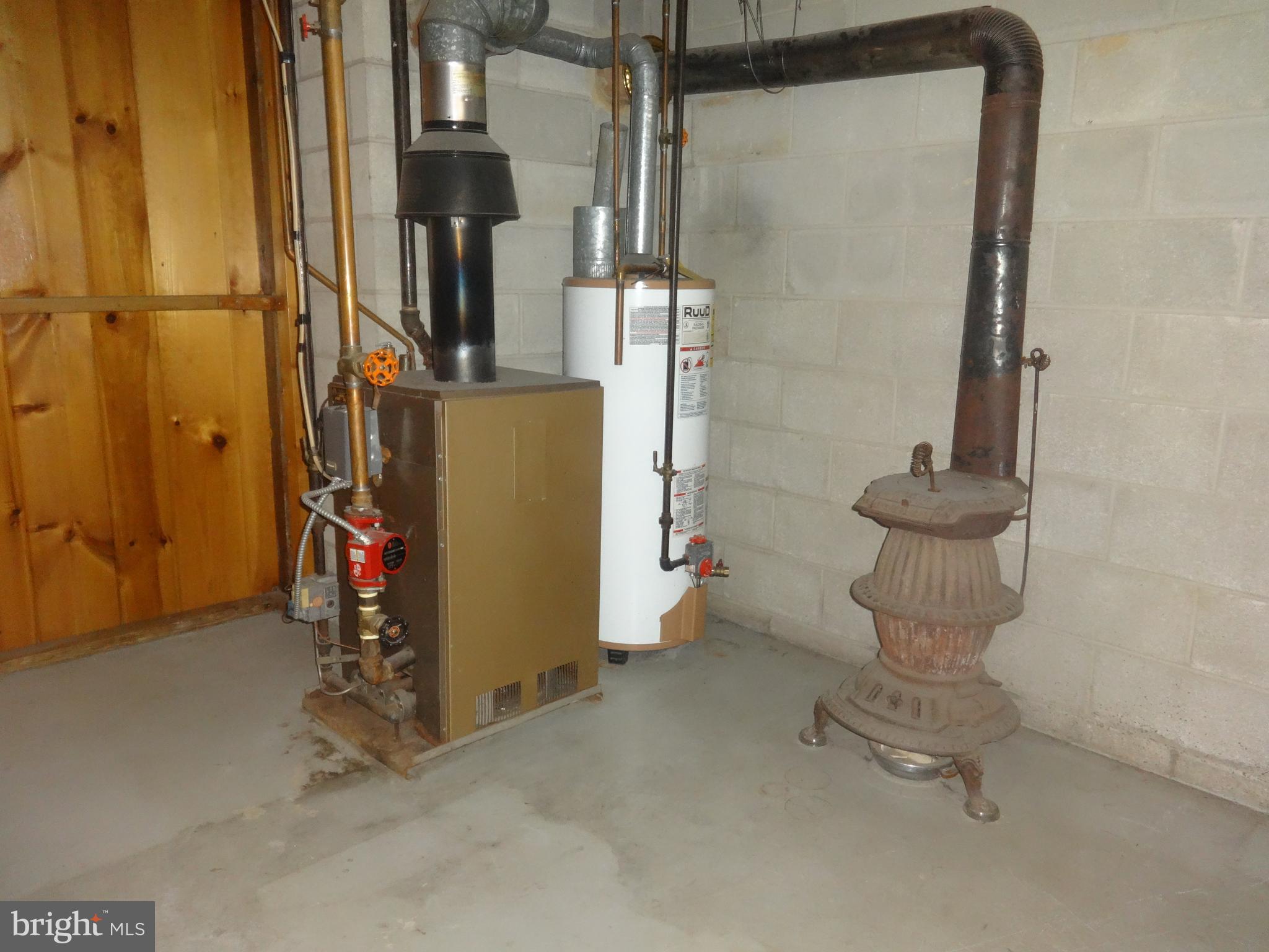 189 Filbert Street Hanover, PA 17331 - Photo 22 of 24 Boiler and Hot Water Heated in Unfinished Basement
