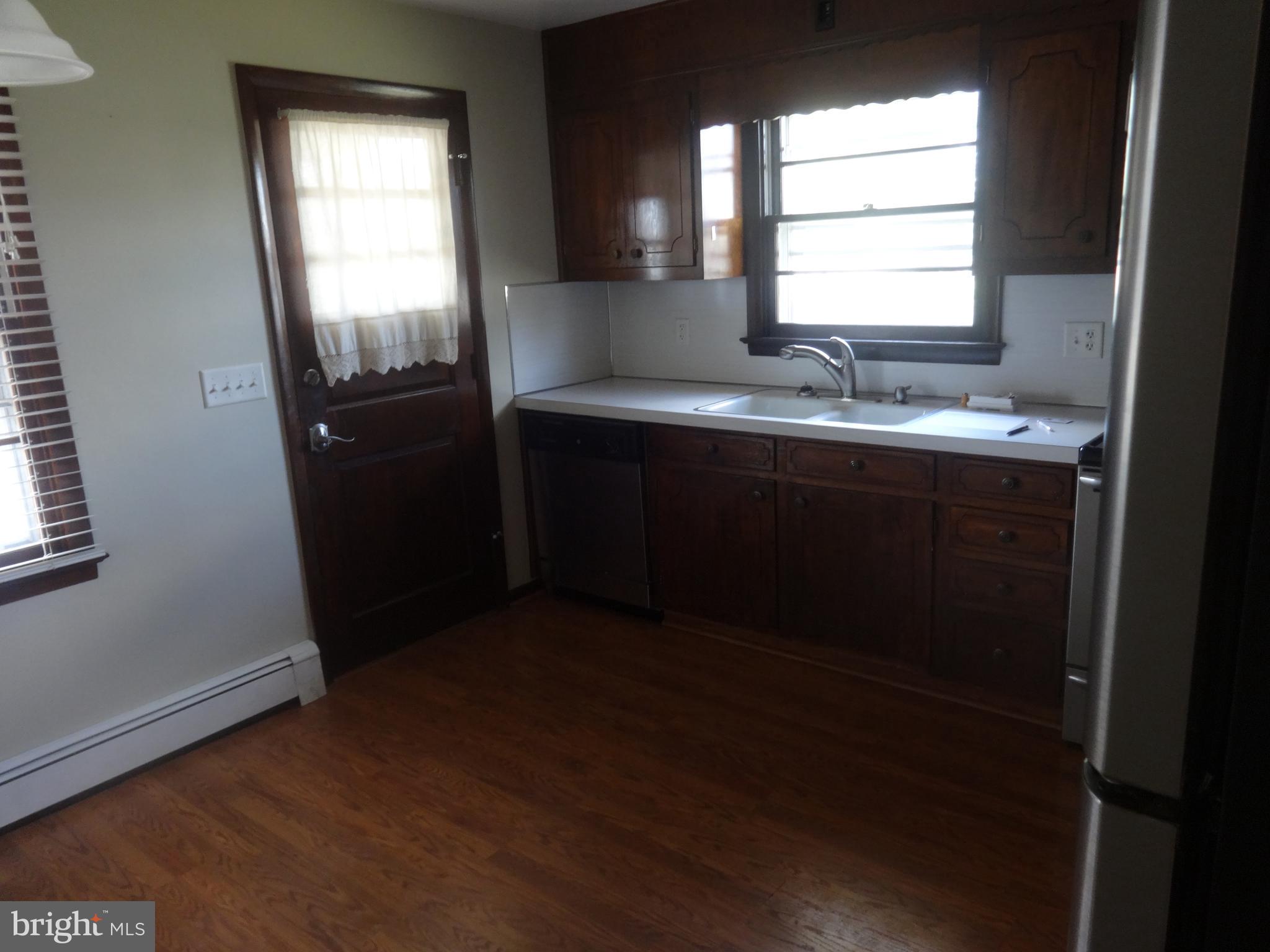 189 Filbert Street Hanover, PA 17331 - Photo 8 of 24 Kitchen Area and Side Entrance