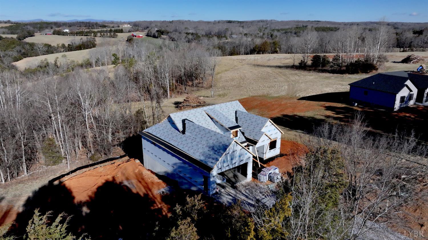 6 Leesville Road Evington, VA 24550 - Photo 14 of 44 an aerial view of a house with a yard swimming pool and mountain view