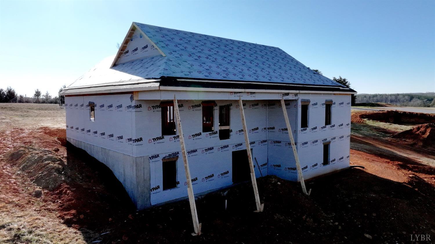 6 Leesville Road Evington, VA 24550 - Photo 18 of 44 a view of a patio with table and chairs with wooden floor and fence