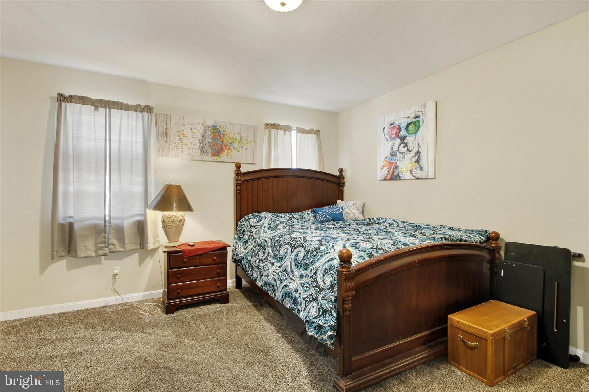 1122 Laurel Drive York, PA 17404 - Photo 28 of 38 a bedroom with a bed and dresser