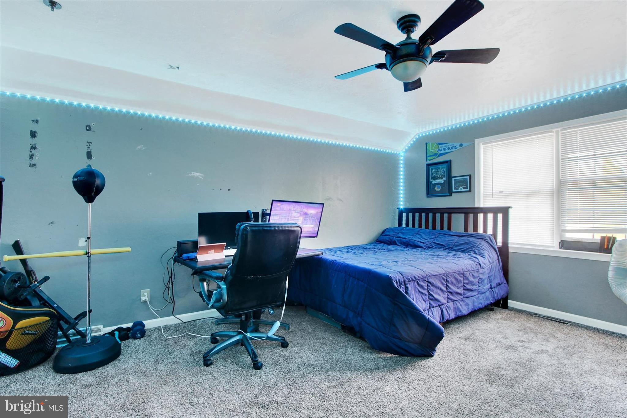 1122 Laurel Drive York, PA 17404 - Photo 29 of 38 a bedroom with a bed a desk and chair