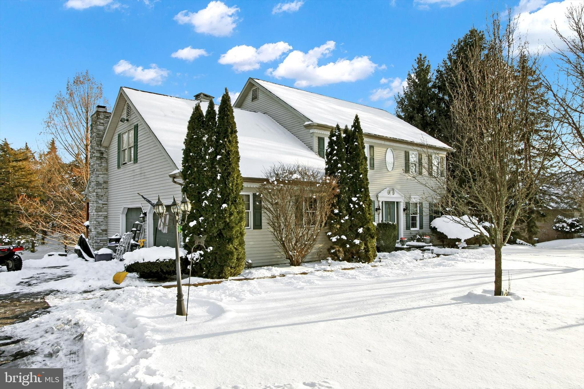 1122 Laurel Drive York, PA 17404 - Photo 3 of 38 a view of a house with snow on the road