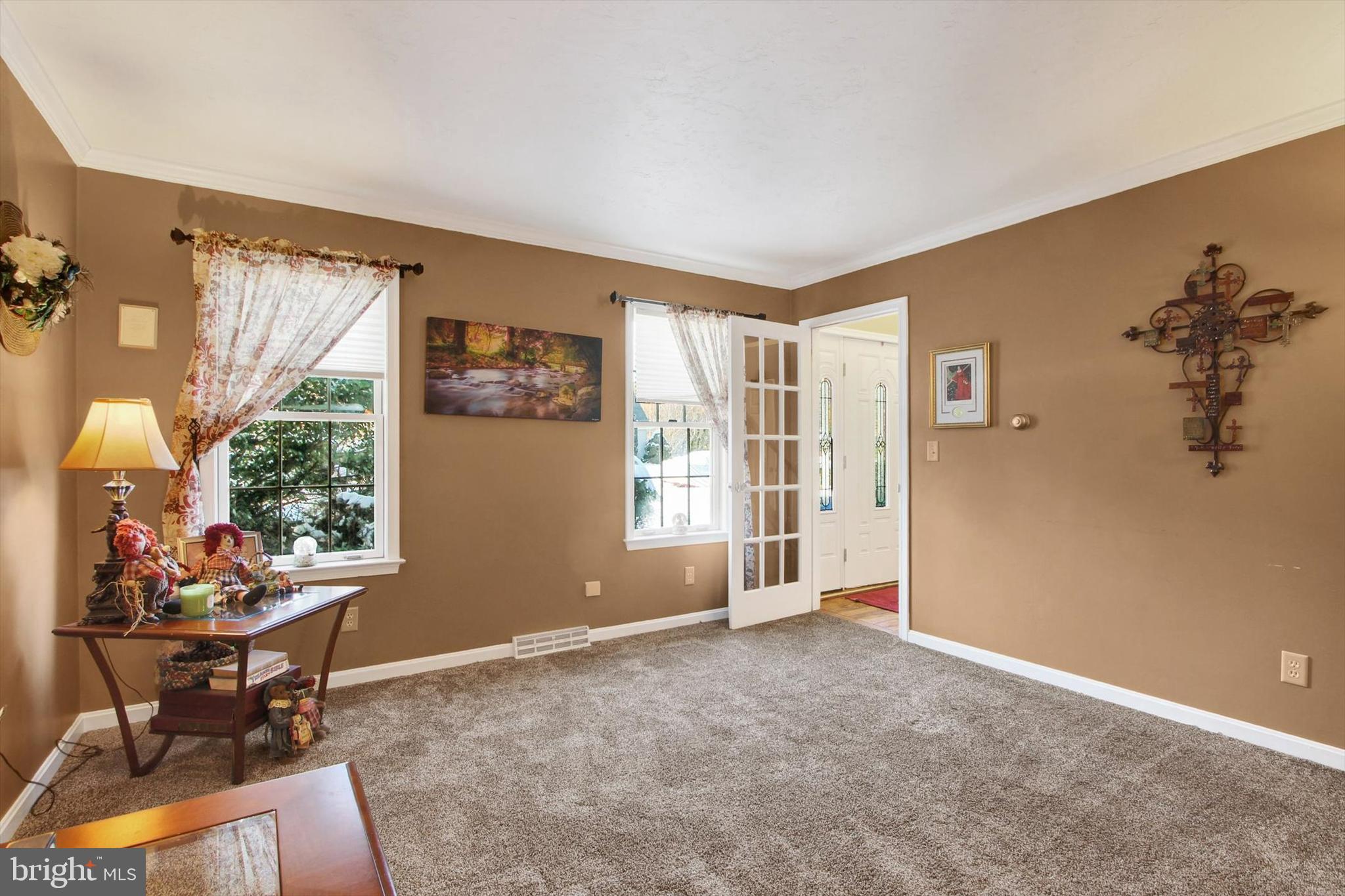 1122 Laurel Drive York, PA 17404 - Photo 6 of 38 a view of an empty room with a window and dining area