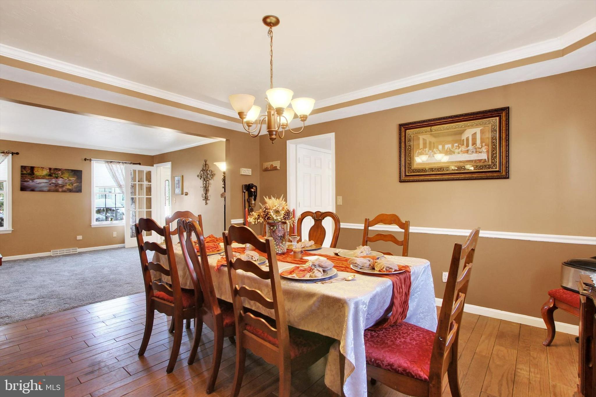 1122 Laurel Drive York, PA 17404 - Photo 9 of 38 a view of a dining room with furniture window and wooden floor