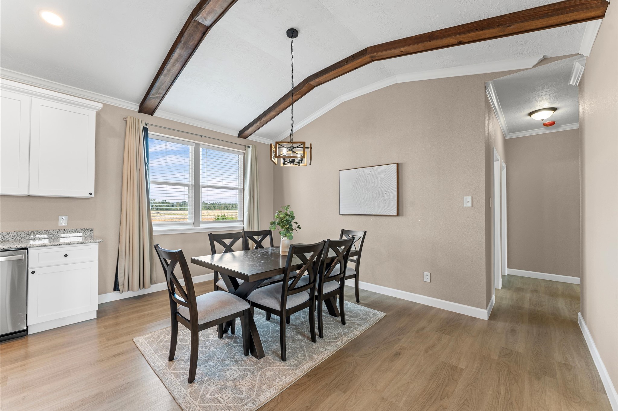1207 Peter Pne Street Huffman, TX 77336 - Photo 12 of 30 a view of a dining room with furniture and wooden floor