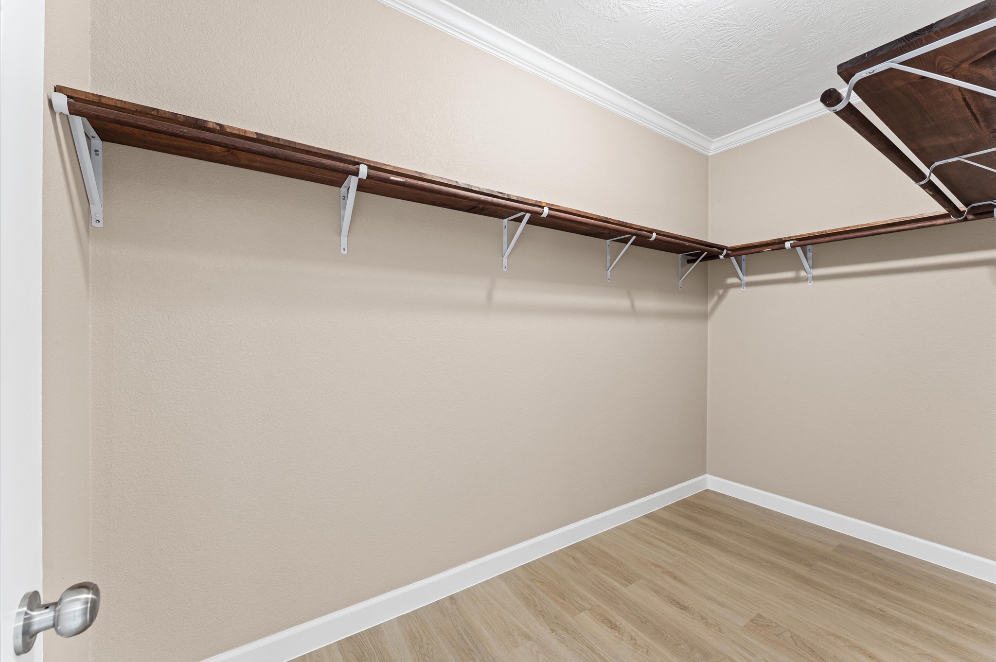 1207 Peter Pne Street Huffman, TX 77336 - Photo 20 of 30 a view of walk in closet with empty racks