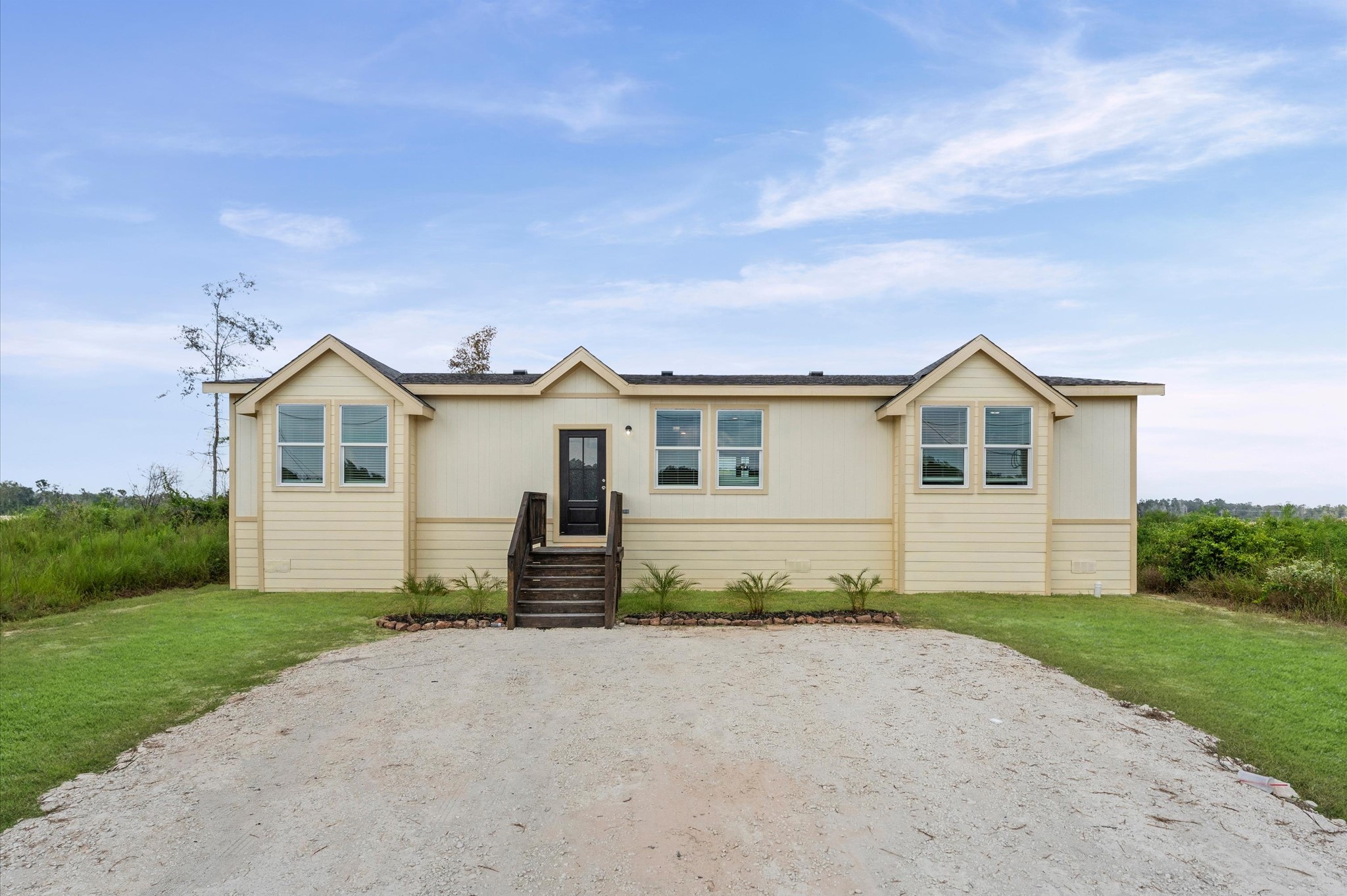 1207 Peter Pne Street Huffman, TX 77336 - Photo 2 of 30 a view of a house with a yard and large tree