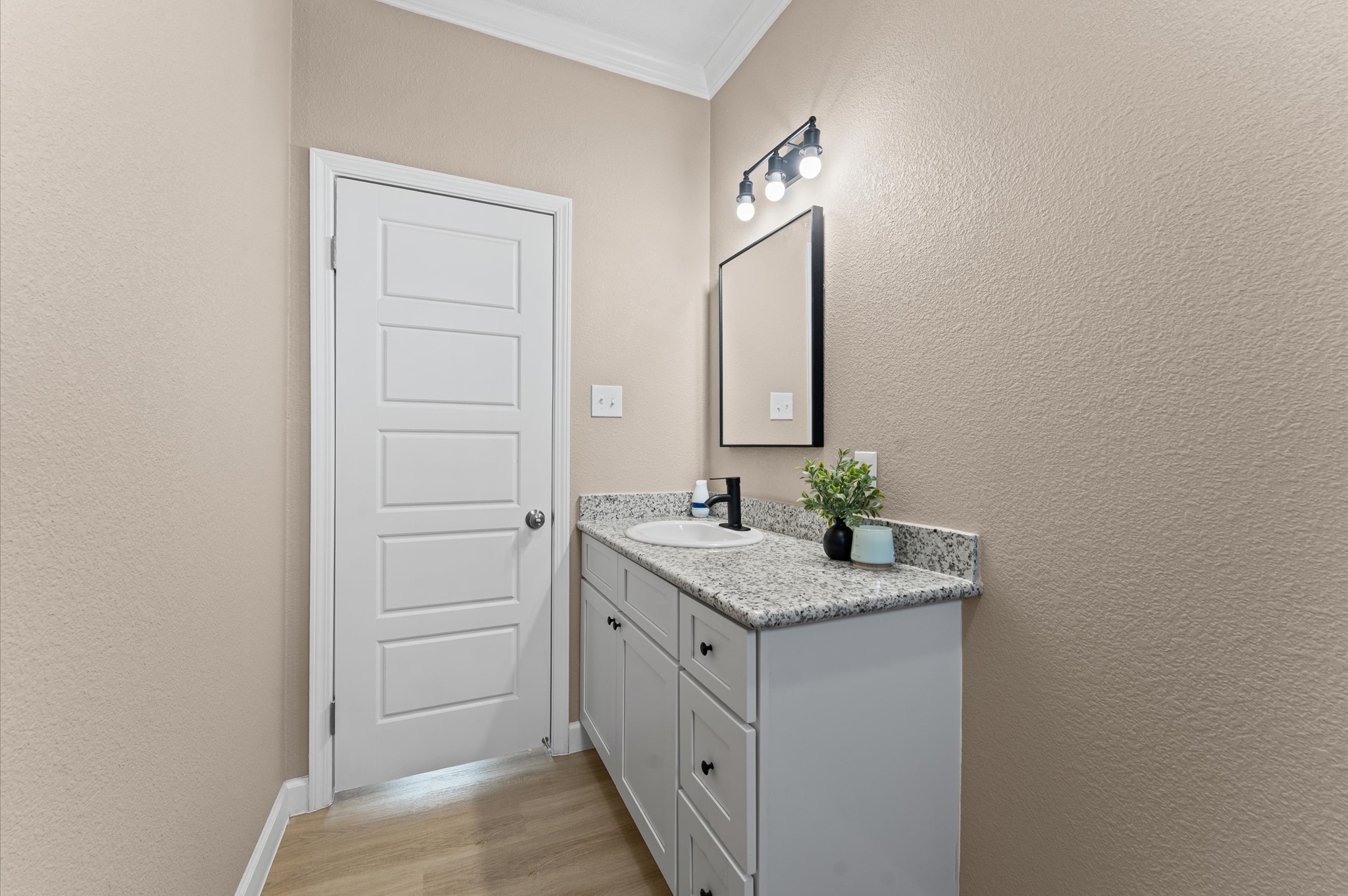 1207 Peter Pne Street Huffman, TX 77336 - Photo 25 of 30 a bathroom with a granite countertop sink and a mirror