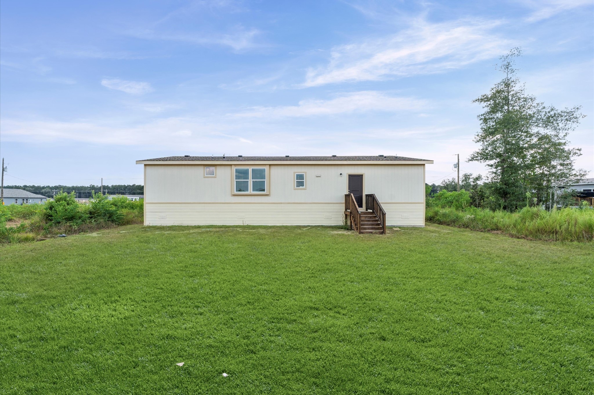 1207 Peter Pne Street Huffman, TX 77336 - Photo 27 of 30 a view of a house with a backyard