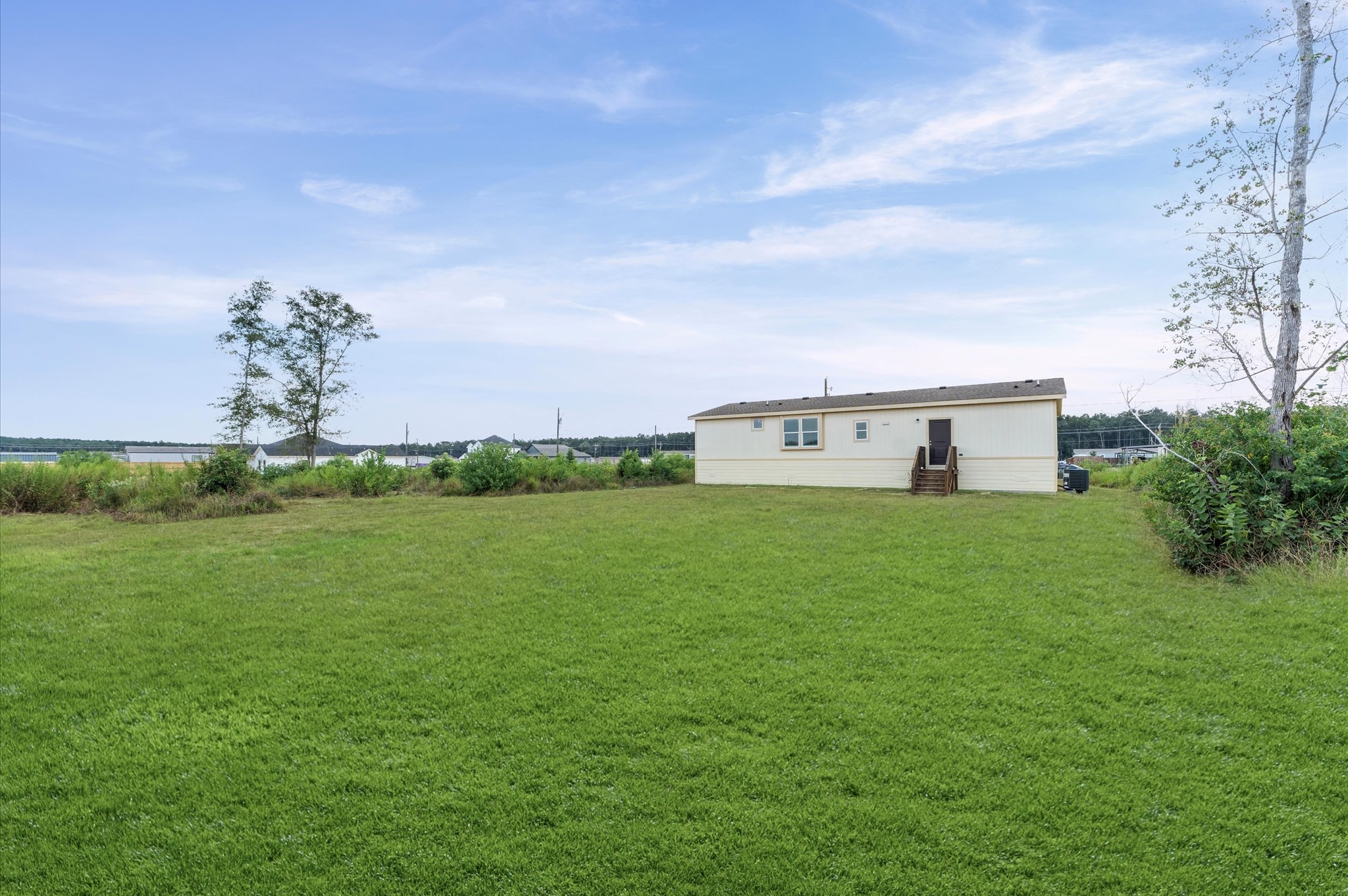 1207 Peter Pne Street Huffman, TX 77336 - Photo 28 of 30 a front view of a house with a yard