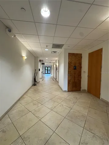 a view of a livingroom with a space and a window