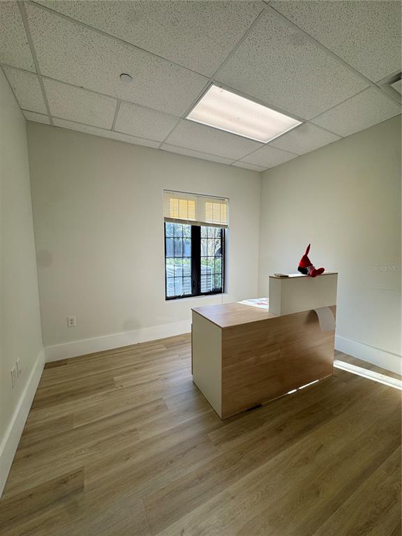 6052 Turkey Lake Road, Unit 118 Orlando, FL 32819 - Photo 5 of 11 a living room with furniture and a window