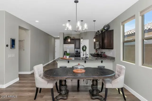 a view of a dining room and chairs in a room