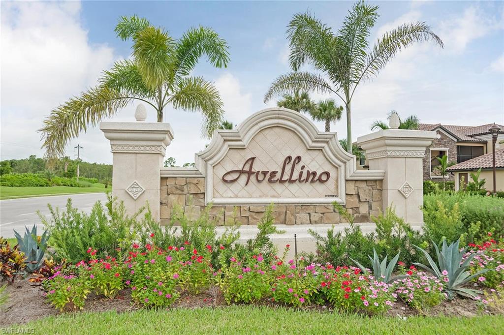 9513 Avellino Way, Unit 2024 Naples, FL 34113 - Photo 2 of 33 a view of front a house with a garden