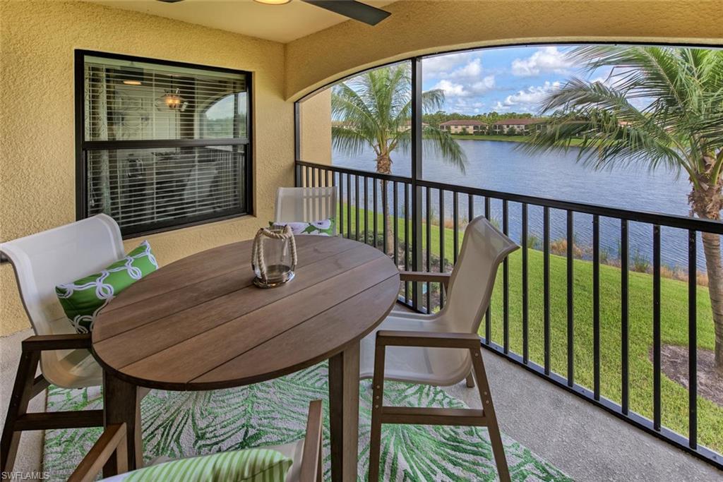 9513 Avellino Way, Unit 2024 Naples, FL 34113 - Photo 21 of 33 a balcony view with a seating space