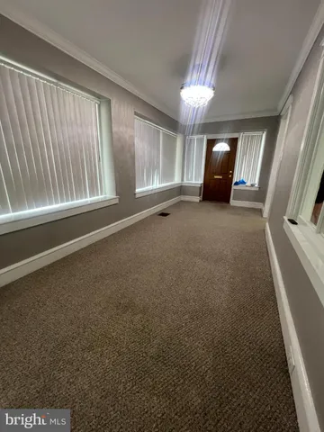 a view of room with window and couch