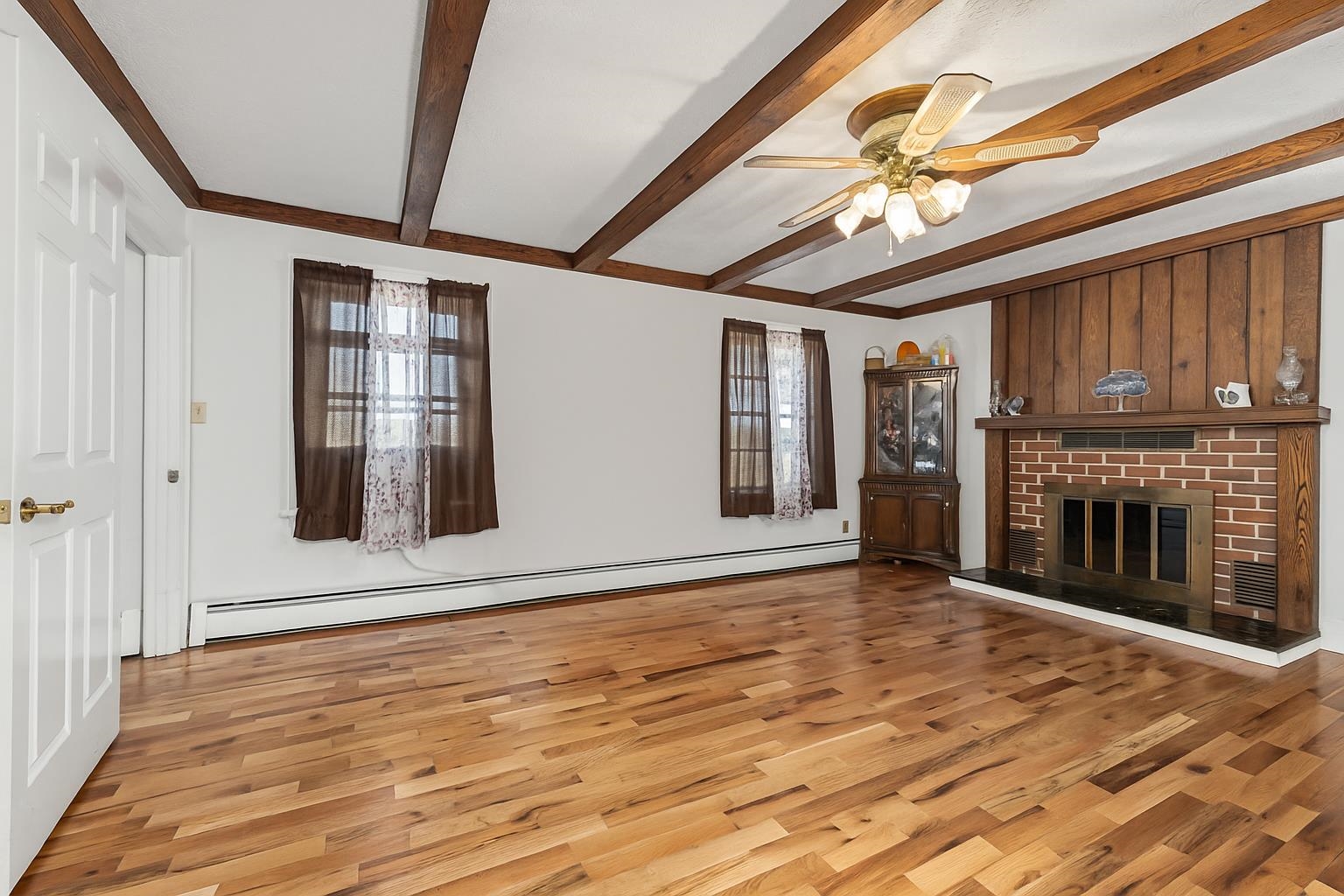 1370 Middlebrook Road Staunton, VA 24401 - Photo 28 of 73 a view of an empty room with a fireplace and chandelier fan