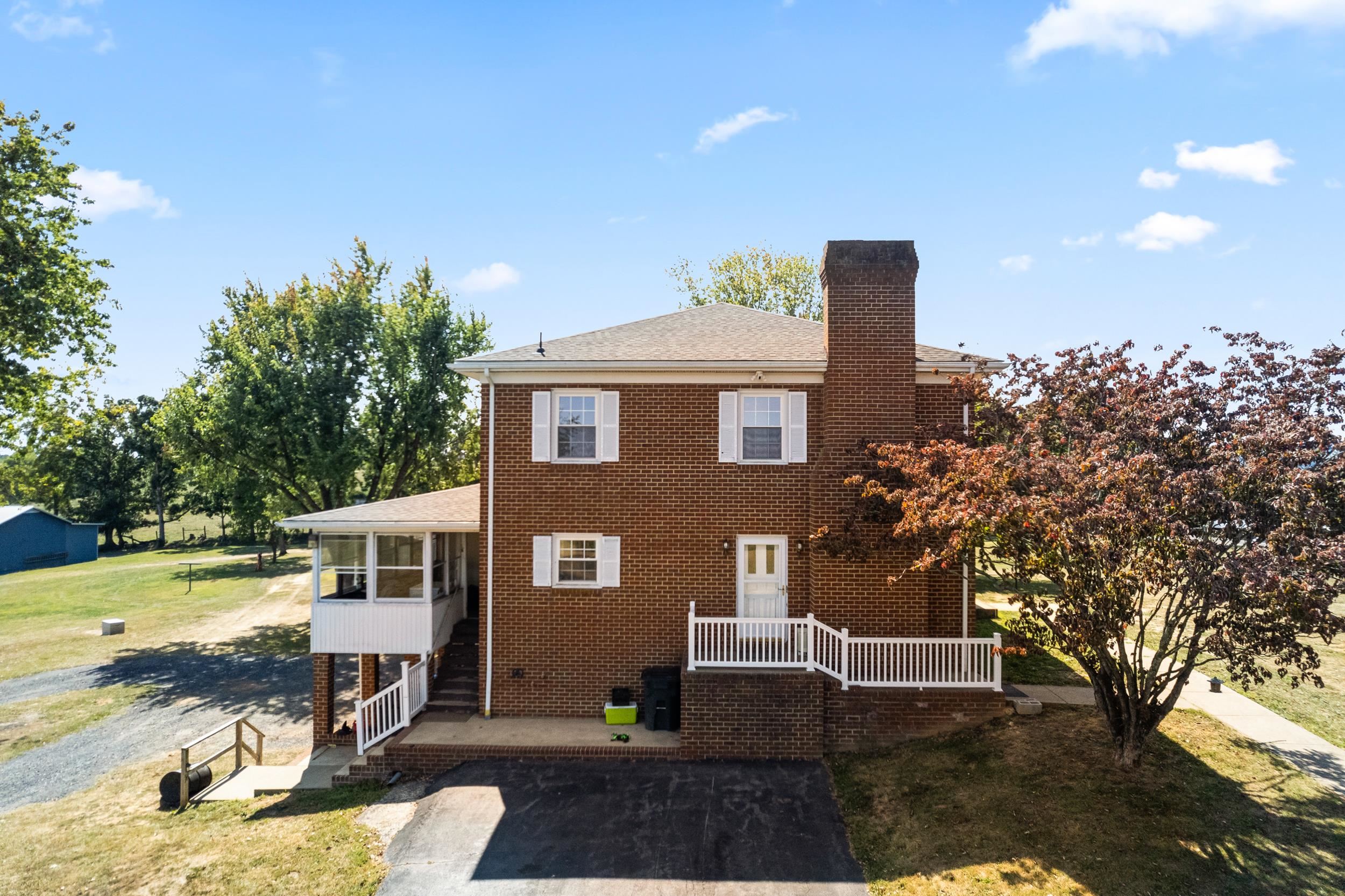 1370 Middlebrook Road Staunton, VA 24401 - Photo 4 of 73 a front view of a house with a yard