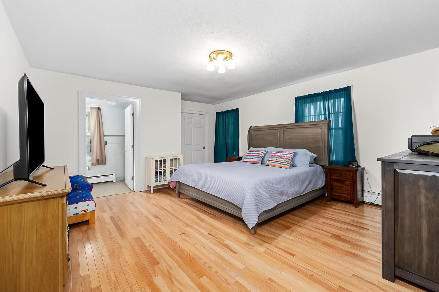 1370 Middlebrook Road Staunton, VA 24401 - Photo 41 of 73 a bedroom with a bed and a flat screen tv
