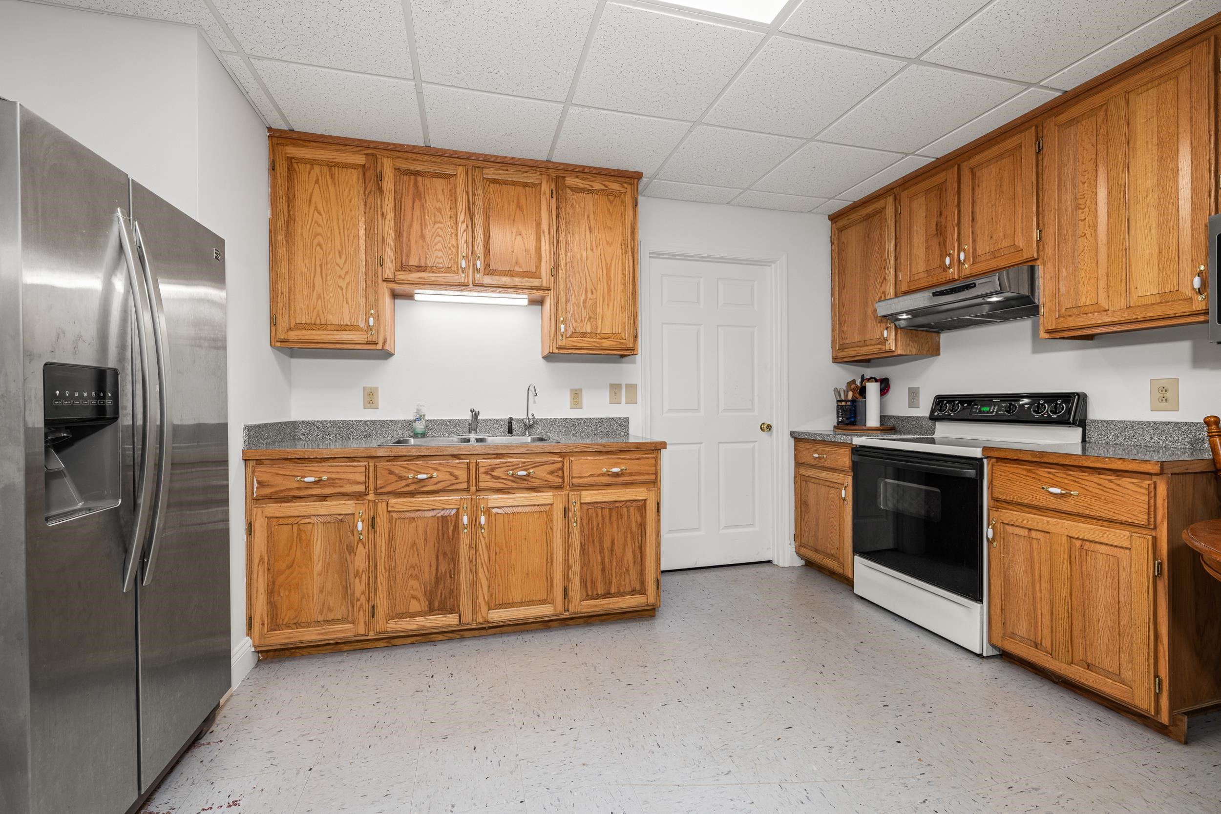 1370 Middlebrook Road Staunton, VA 24401 - Photo 53 of 73 a kitchen with stainless steel appliances granite countertop a stove sink and refrigerator