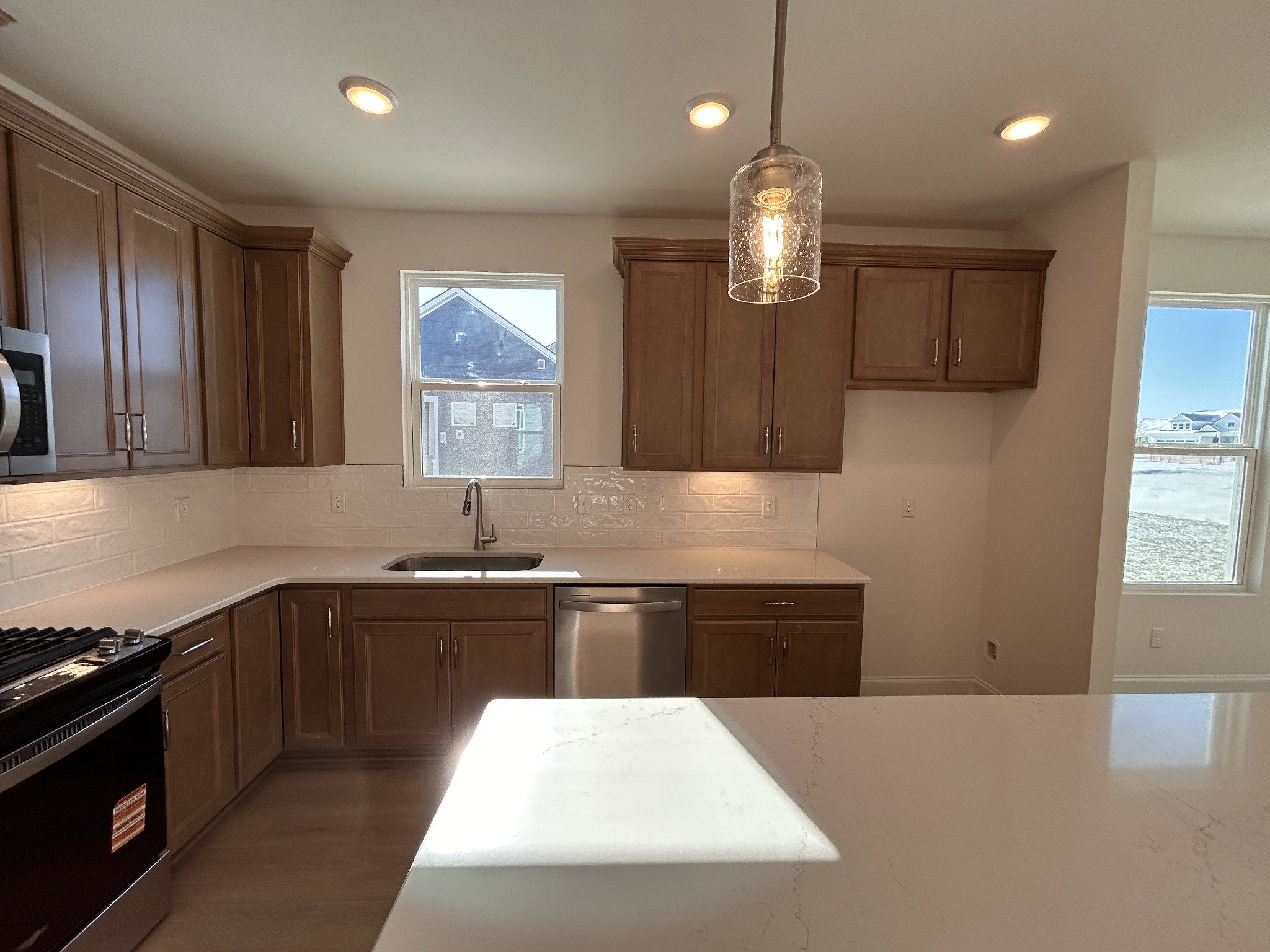 420 Sharp Way Murfreesboro, TN 37128 - Photo 5 of 51 a kitchen with stainless steel appliances a sink stove and cabinets