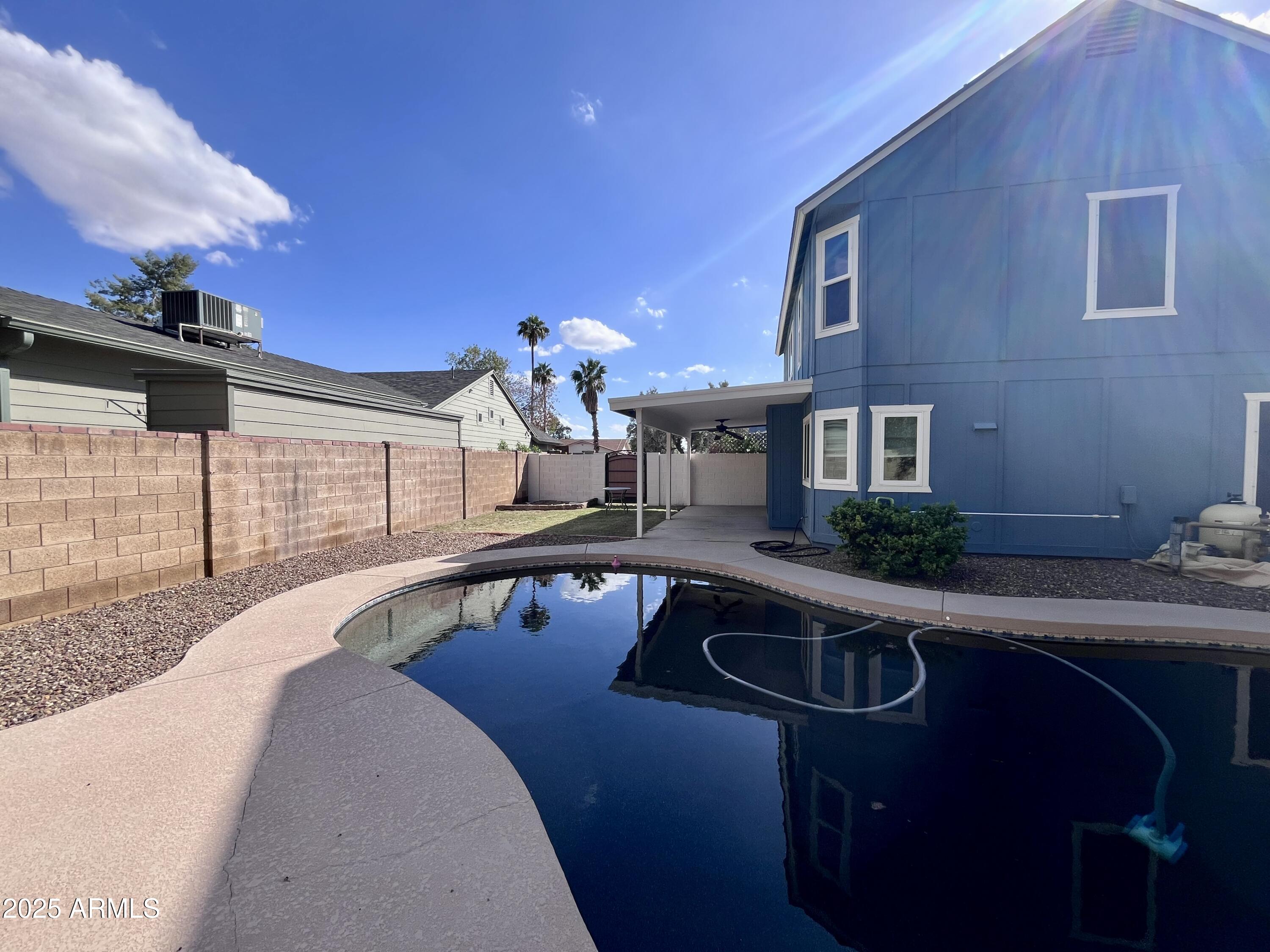 4924 East Hillery Drive Scottsdale, AZ 85254 - Photo 24 of 24 a front view of a house with swimming pool
