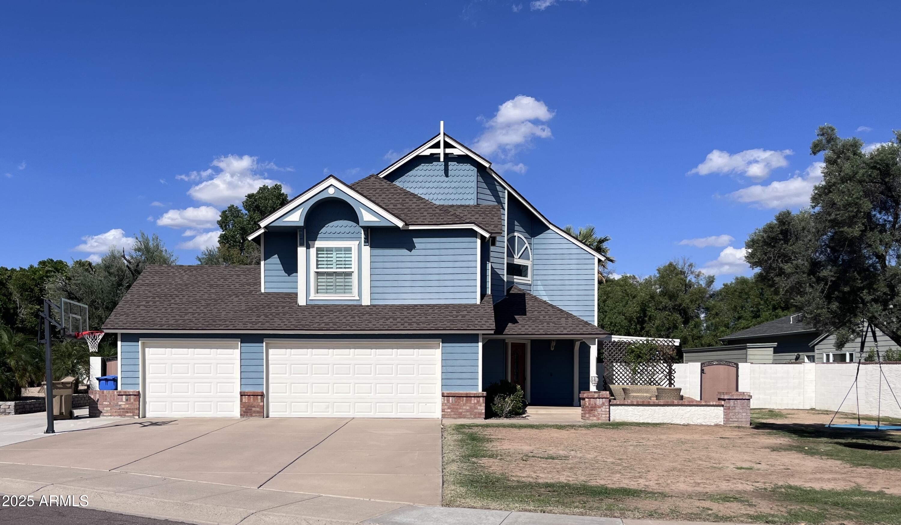 4924 East Hillery Drive Scottsdale, AZ 85254 - Photo 6 of 24 a front view of a house with a yard